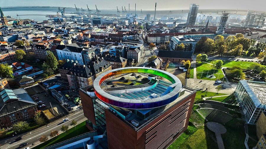 ARoS Aarhus Art Museum from above with the Rainbow Panorama on the roof
