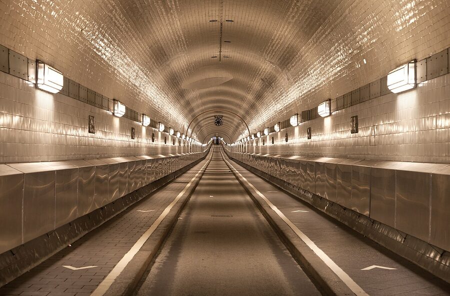 The empty white-tiled interior of the Alter Elbtunnel under the Elbe river