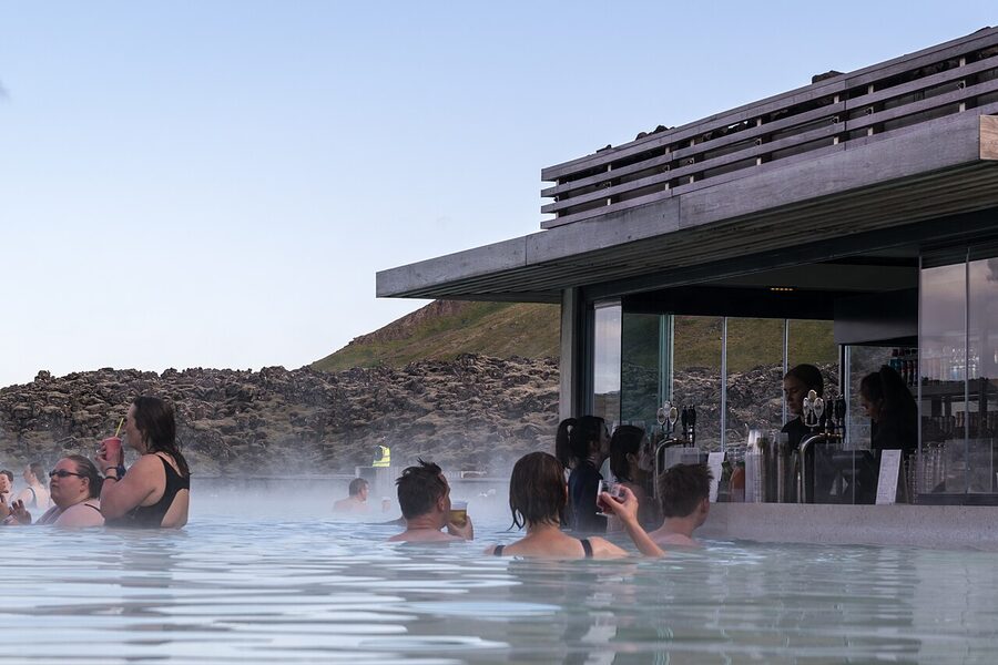 The Blue Lagoon thermal pool in Iceland with bathers in milky water