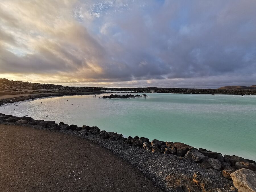 The Blue Lagoon at the edge with bathers