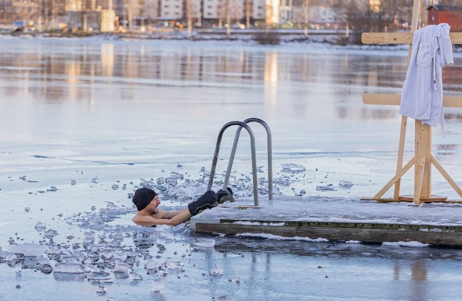 A cold plunge pool with a person submerged