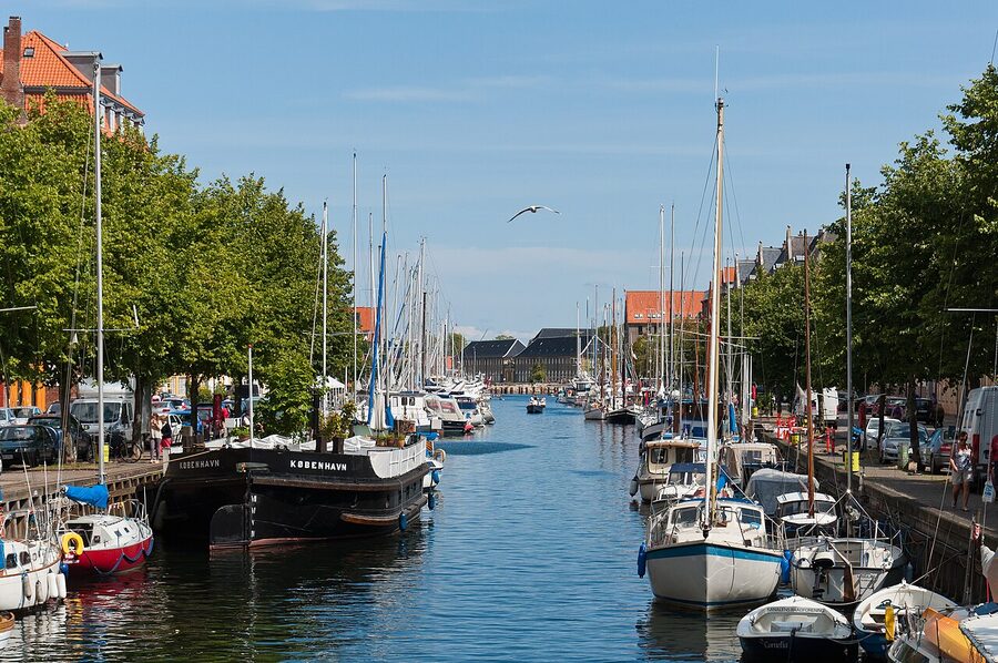 Christianshavn canal with houseboats moored along the quay