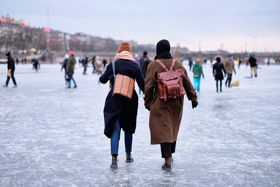 People walking on the frozen Søerne lakes in central Copenhagen in winter