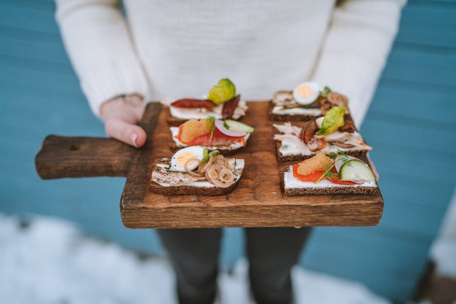 Close-up of open-faced Danish sandwiches with eggs and vegetables