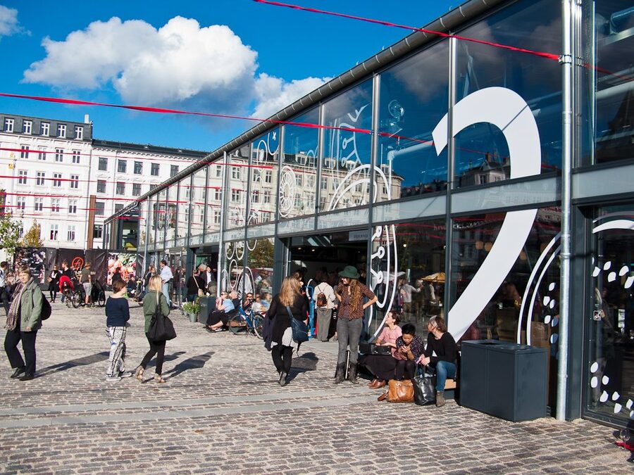 Torvehallerne covered food market in Copenhagen with stalls and shoppers