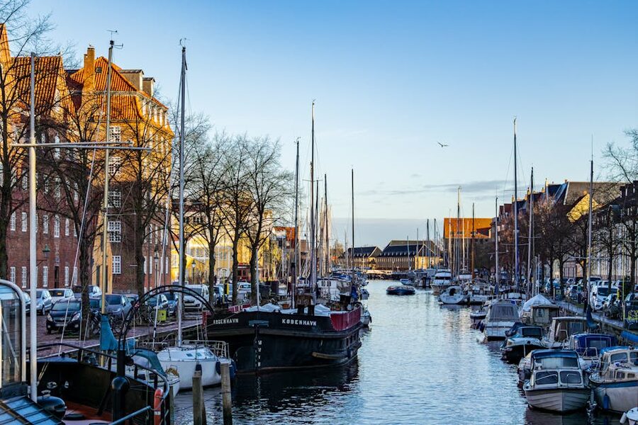 Christianshavn canal in winter sun with boats and colourful houses