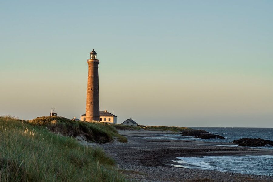 Skagen lighthouse with the empty winter beach behind it