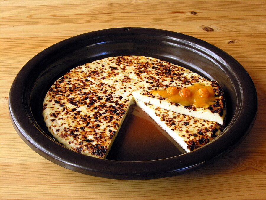 Warm leipäjuusto, the squeaky bread cheese, served with cloudberry jam
