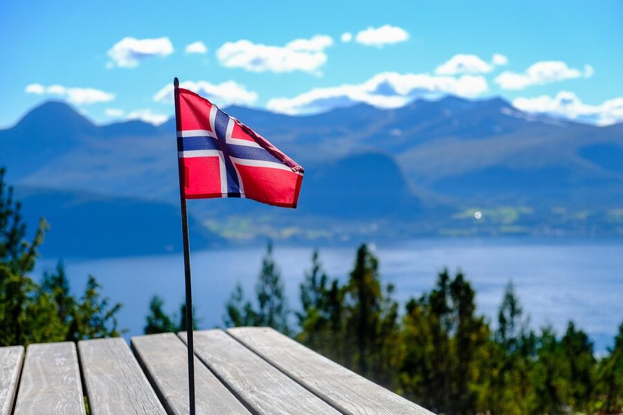 Norwegian fjord with steep mountains on either side