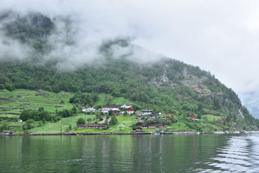 Geiranger village under mist with surrounding hills