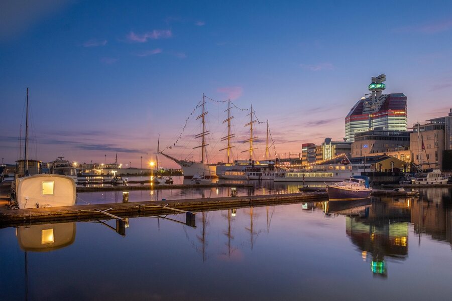 Sailboats at Lilla Bommen marina with the Skanskaskrapan tower in Gothenburg