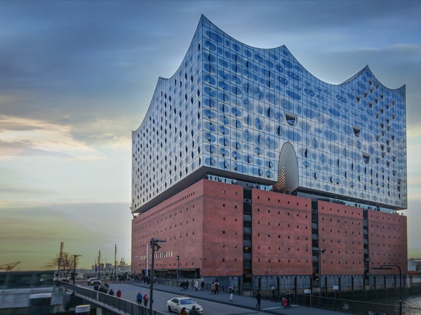 The Elbphilharmonie at twilight, with HafenCity in the foreground