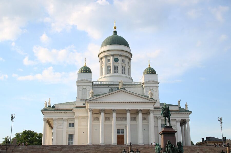 Helsinki skyline from the water with church spires and harbour buildings