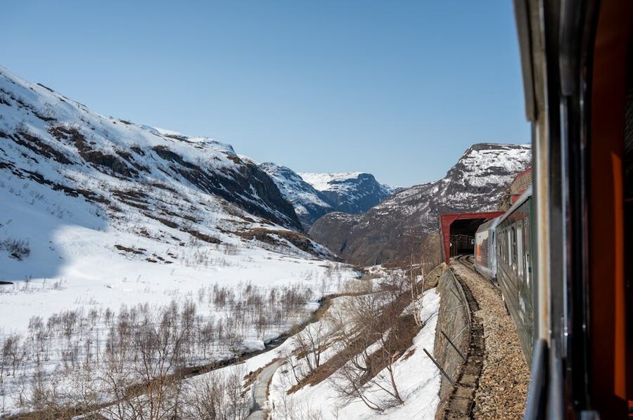 Bergen Line train crossing the snow-covered Hardangervidda plateau in Norway