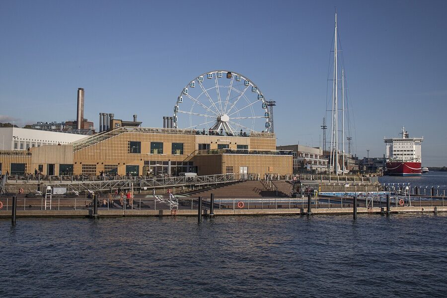 Allas Sea Pool decking with cathedral and harbour in background