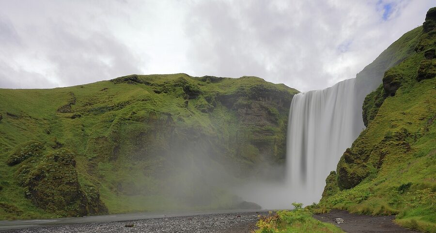 Skógafoss waterfall in summer with the iconic single drop