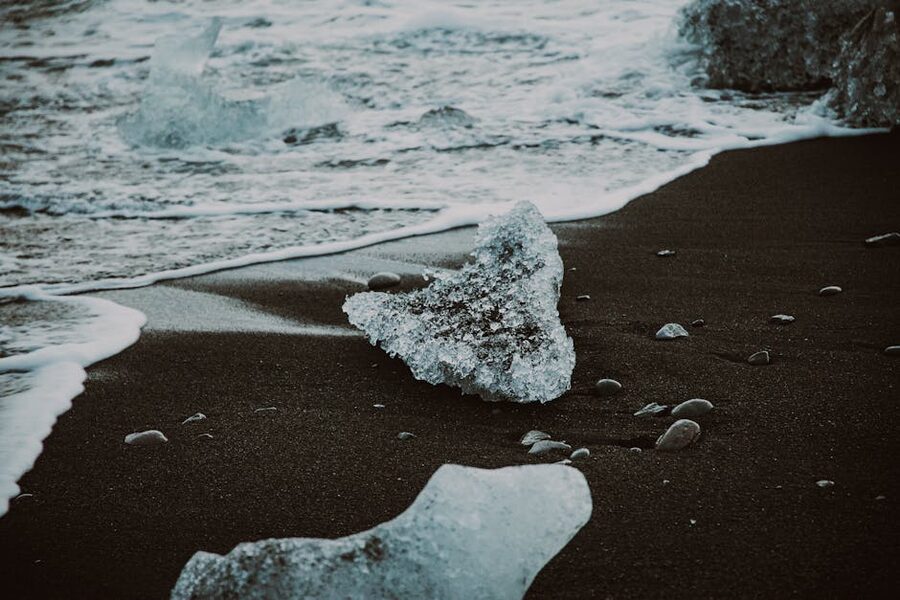 Translucent icebergs on the black sand of Diamond Beach