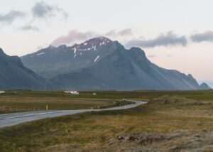 Empty road through Icelandic mountain landscape on Route 1