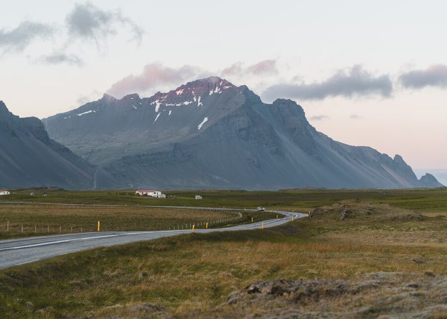 Empty road through Icelandic mountain landscape on Route 1