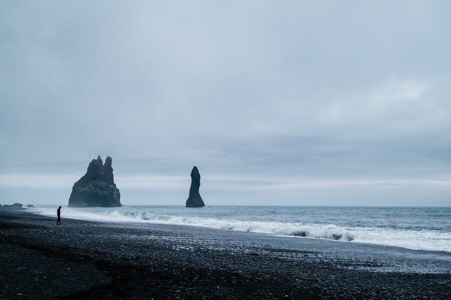Reynisfjara black sand beach with basalt sea stacks