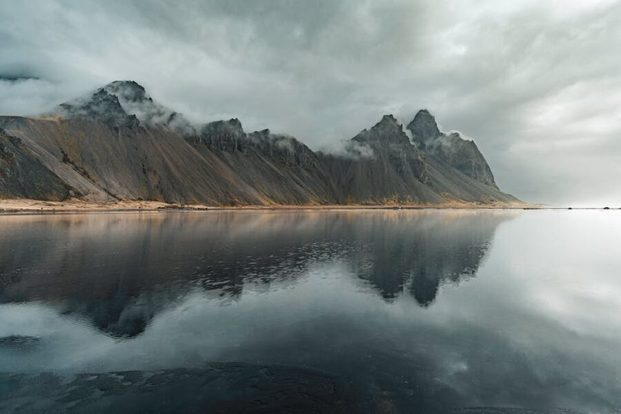 Vestrahorn mountain reflected in still water at Stokksnes
