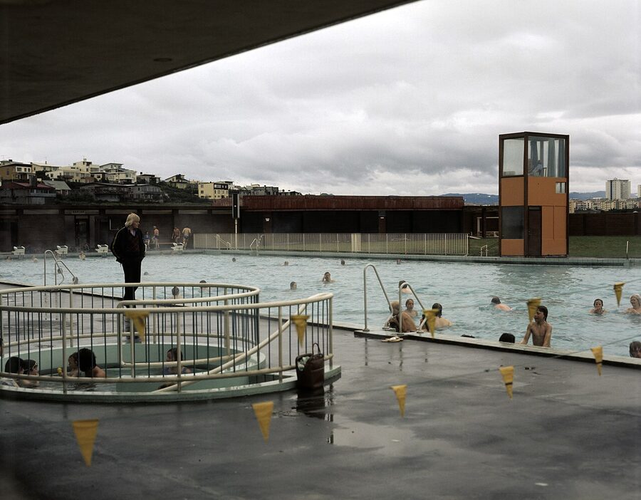 The 50m outdoor pool at Laugardalslaug with hot pots in the foreground