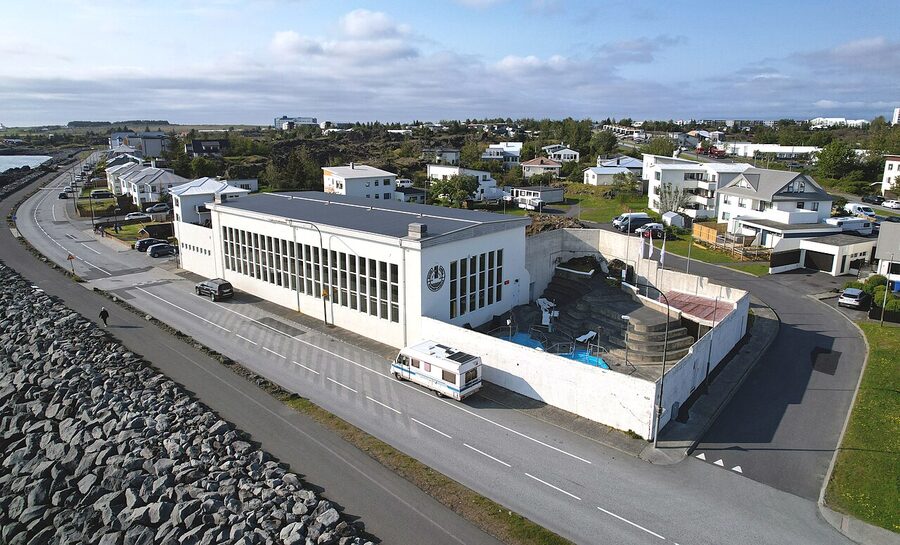 The exterior of Sundhöll Hafnarfjarðar with its modern wooden cladding