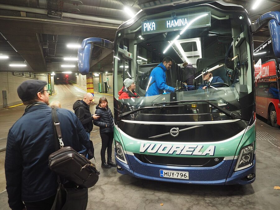 Passengers boarding an intercity coach at Kamppi bus station in Helsinki