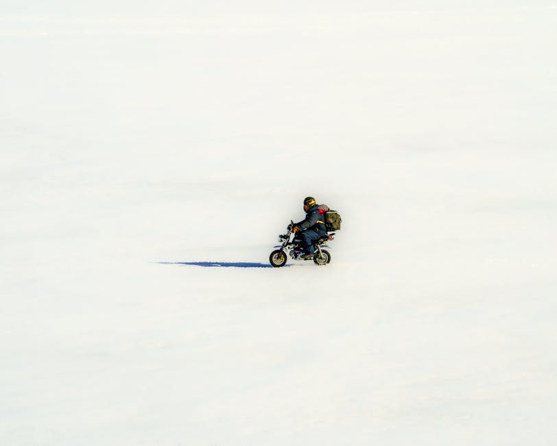 Lone rider crossing the snowfield in Kemi, Lappi