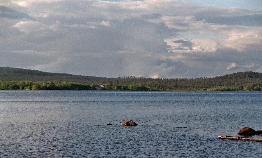 Inari village houses by the lake in summer