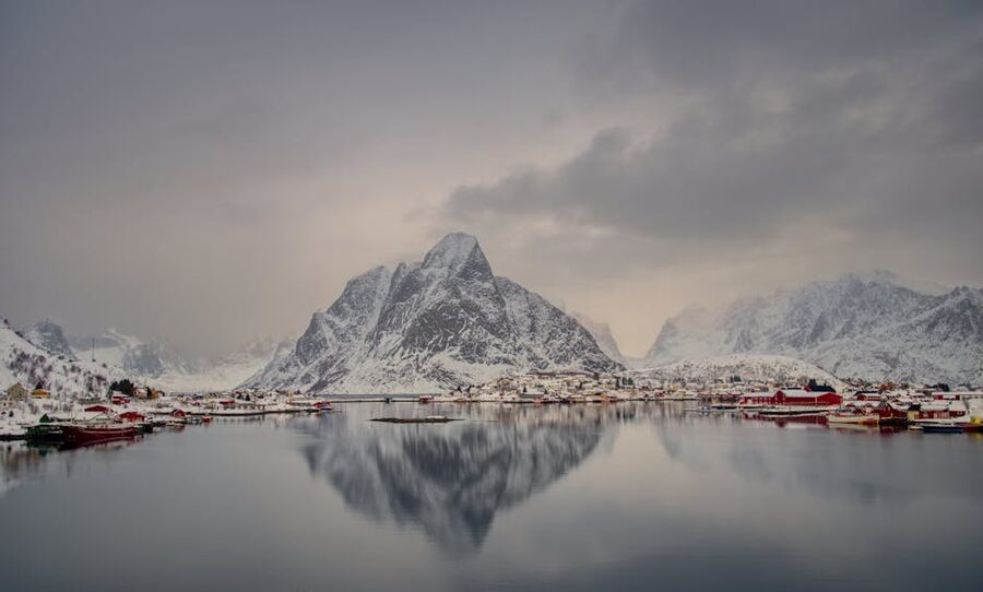 Hamnøy red rorbu cabins at sunset in winter