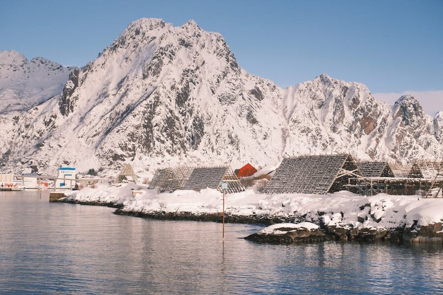 Svolvær harbour with colourful buildings and mountains
