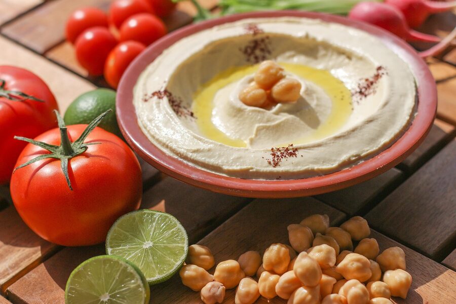 A plate of falafel with hummus and tabbouleh