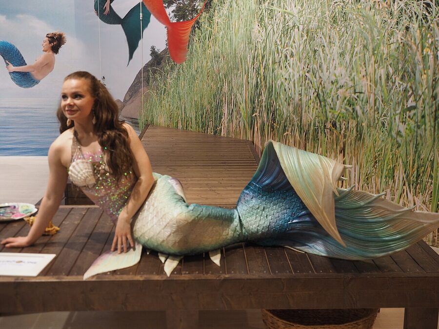 A mermaid performer on the central stage at Helsinki Travel Fair 2019