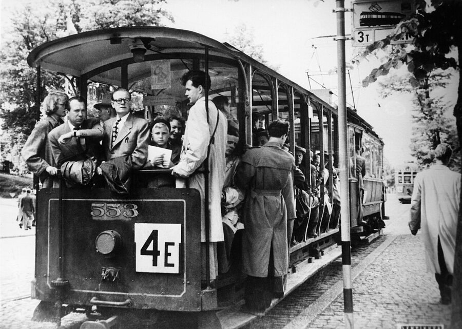 Vintage 1952 photograph of a Helsinki tram pulling a caravan