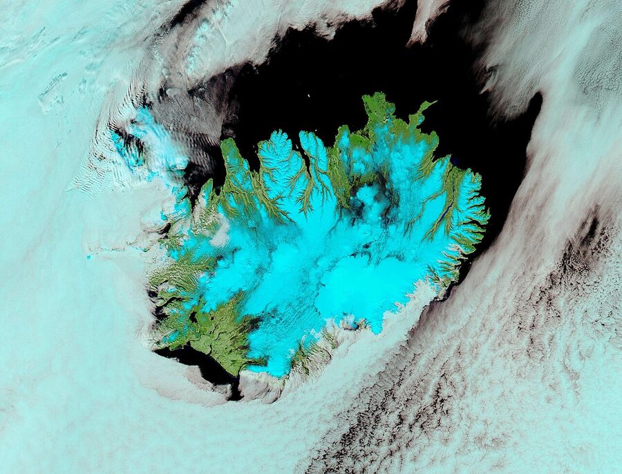 Satellite image of Iceland surrounded by cloud cover, MODIS Aqua, April 2022