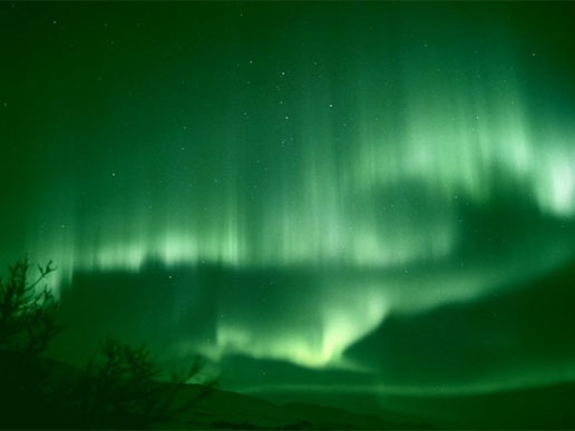 Solar wind streams from coronal holes hitting Earth's magnetic field