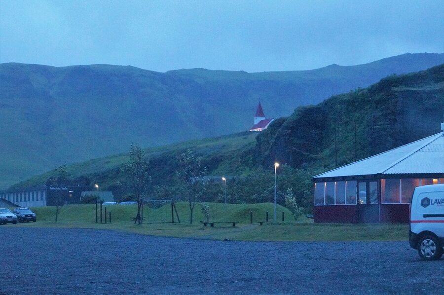 Vík í Mýrdal campsite and Víkurkirkja church at night