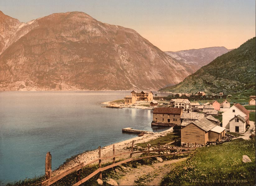 Eidfjord village at the eastern arm of Hardangerfjord with mountains behind