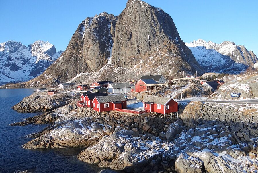 Hamnoy red rorbu cabins and bridge in Lofoten Norway