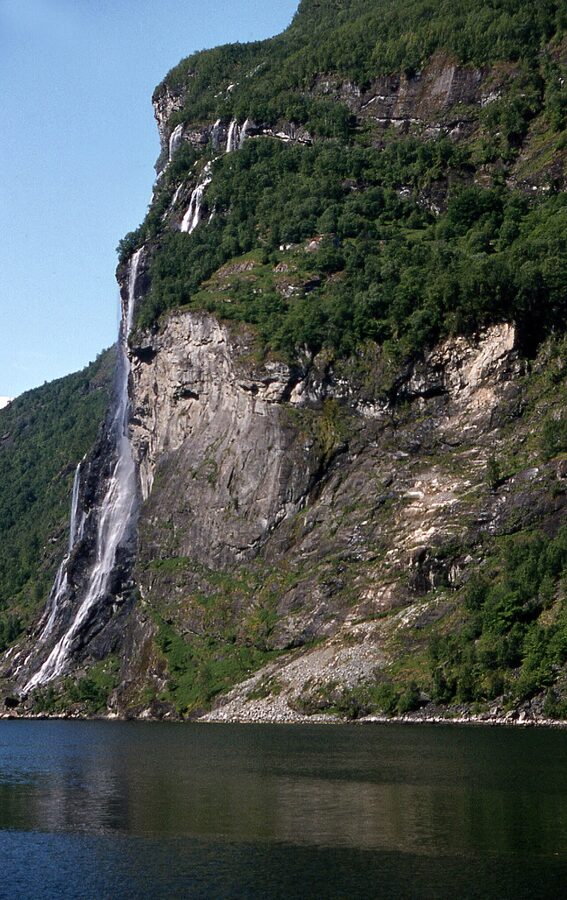 Seven Sisters waterfalls dropping into Geirangerfjord from the south cliff face