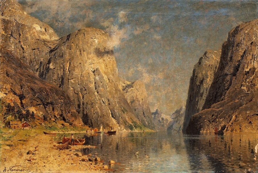 Inner Sognefjord with mountains reflecting in still water in late spring