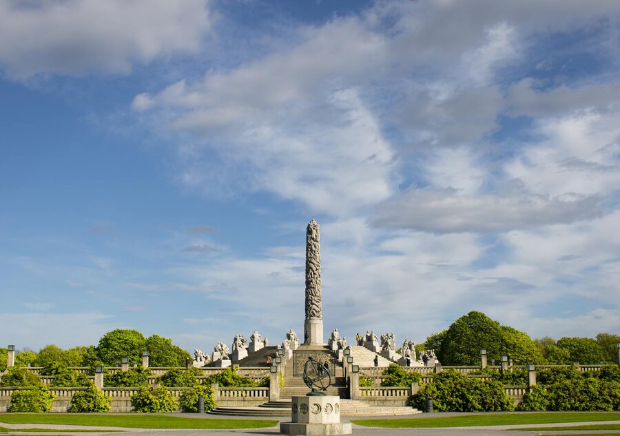 The Monolith at Vigeland Sculpture Park, Oslo, against blue sky