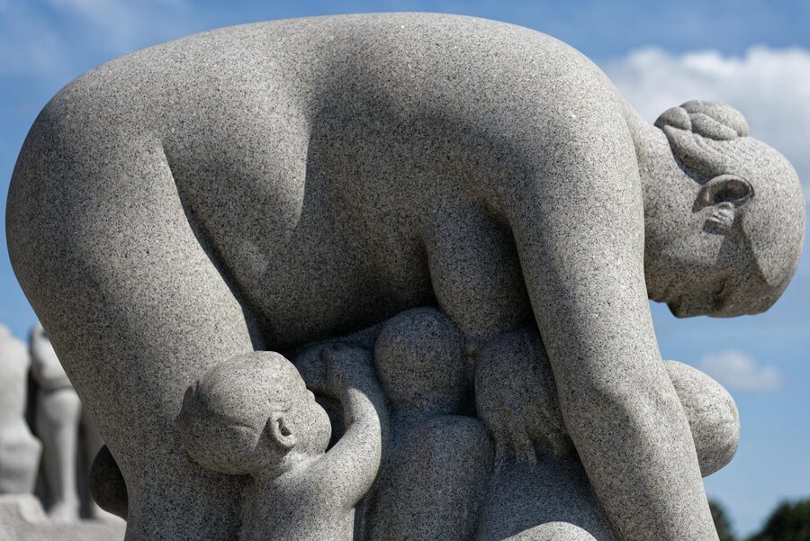 Stone sculpture of a woman and children at Vigeland Park, Oslo