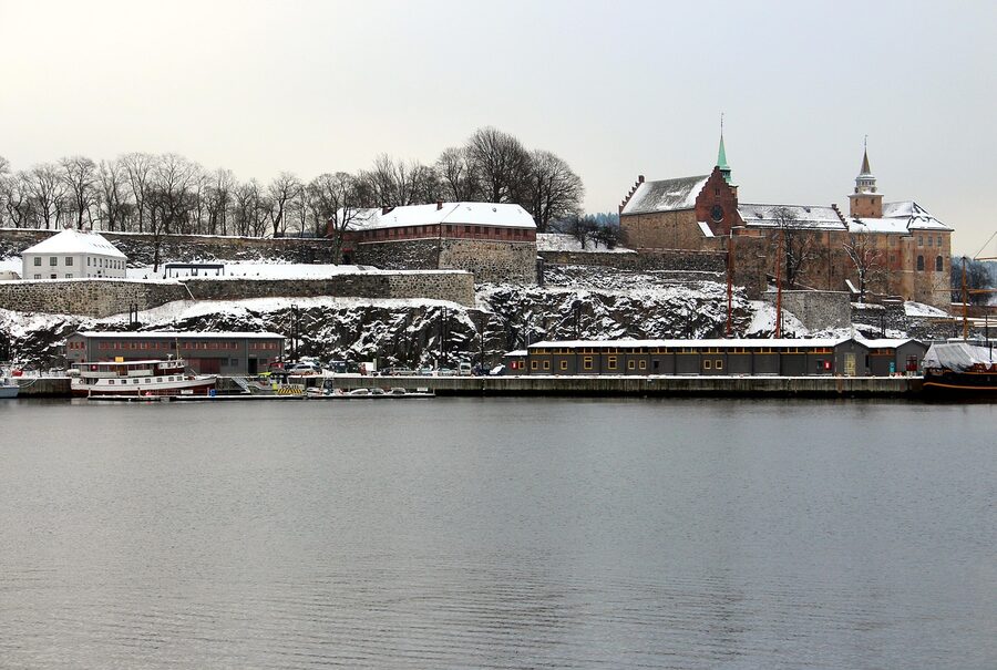 Akershus Fortress in winter with snow and the Oslofjord