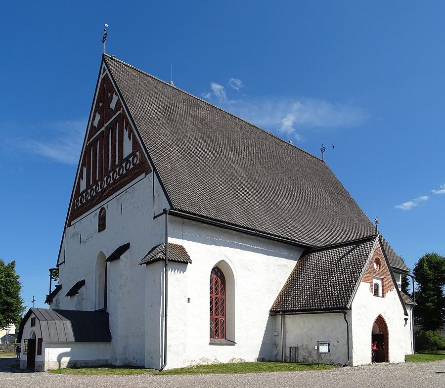 Porvoo Cathedral exterior with stepped gable roof and red tile, set on a small hill above the Old Town