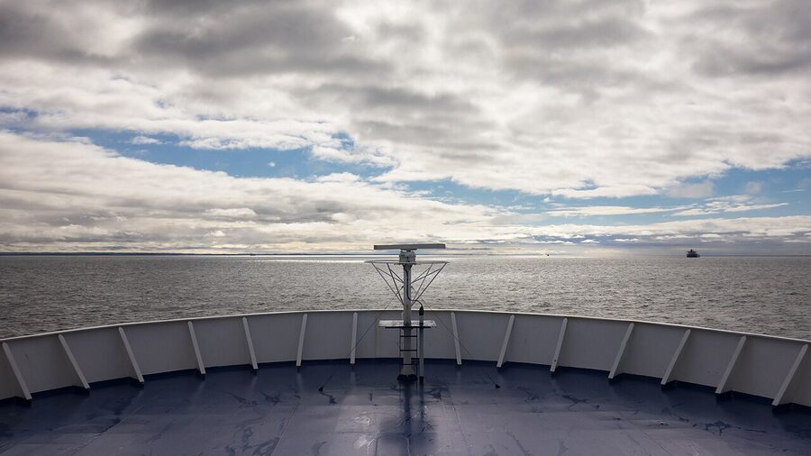 Bow of Stena Danica ferry crossing the Kattegat with morning light on the water