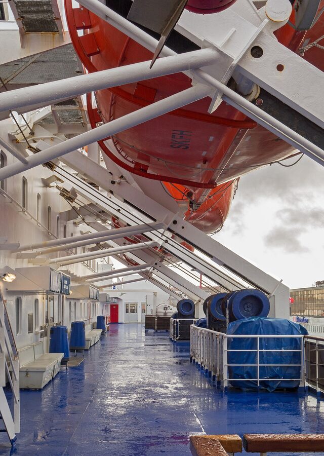 Lifeboat deck on Stena Danica with orange lifeboats and the Kattegat horizon