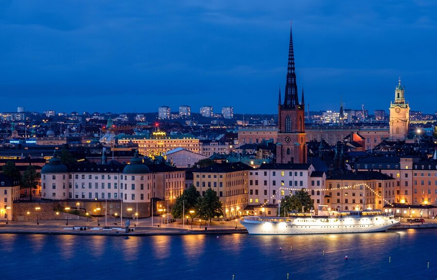 Stockholm in winter with snow on rooftops of Gamla Stan and frozen waterways visible