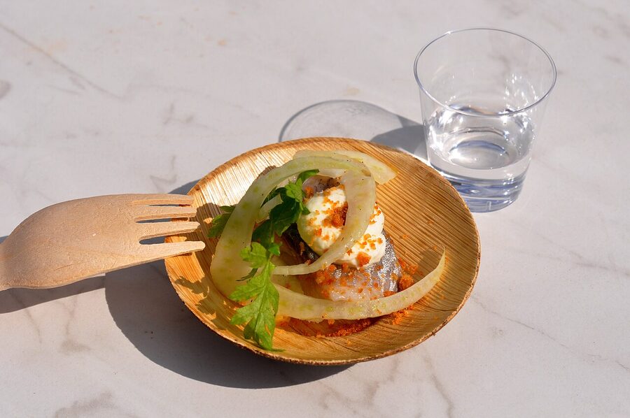 Pickled herring with fennel and a glass of Rød Aalborg akvavit